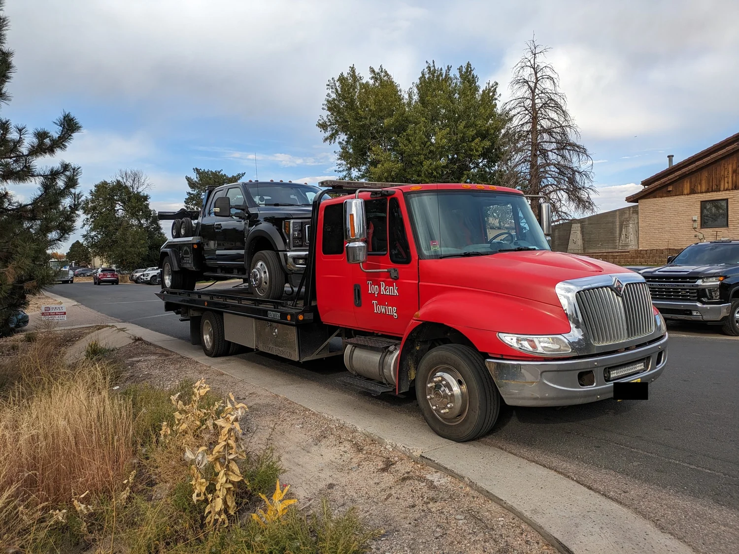 Top Rank Towing flatbed truck