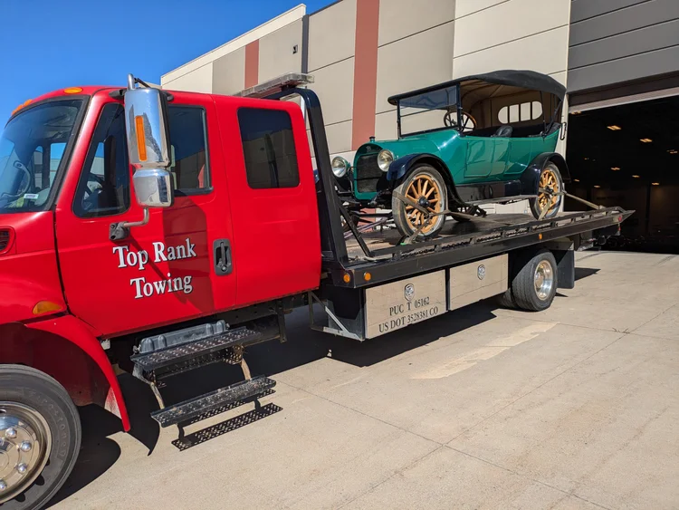 Top Rank Towing flatbed on a service call